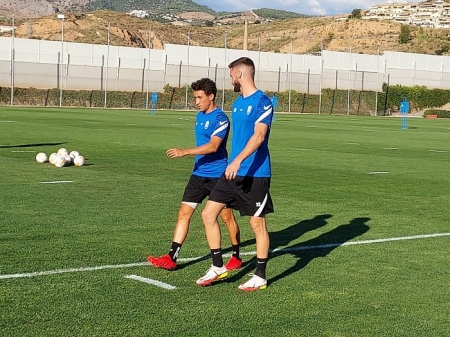 Milla, junto a Domingos Duarte, en el entrenamiento de hoy en la Ciudad Deportiva (FRAN CALVO)