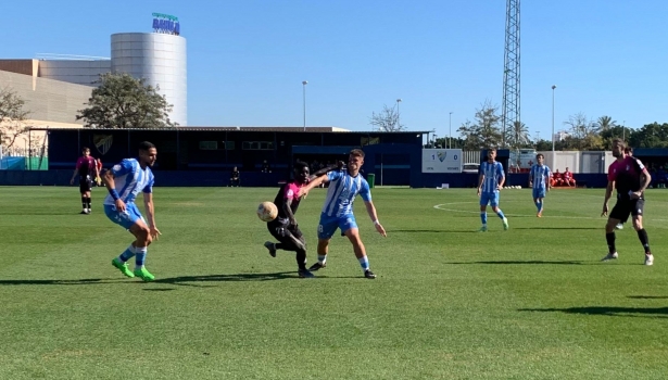 Lance del partido disputado en Málaga (ARENAS DE ARMILLA)