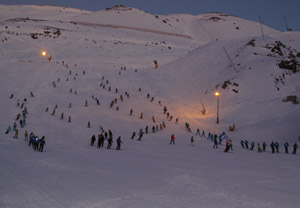 Bajada por la pista de el Rio iluminada