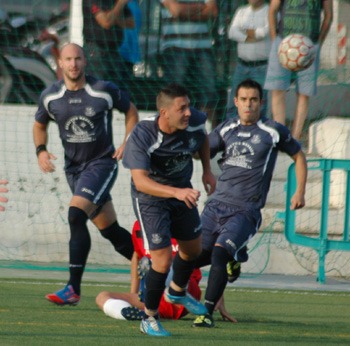 El equipo sénior del Puerto de Motril en pleno encuentro