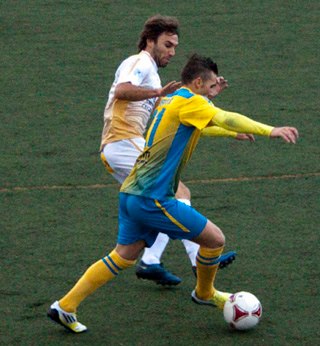 Lance de un partido del CD Huétor Tájar (PUNTOPENALTI.COM)