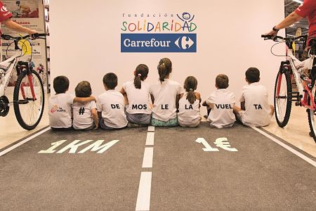 Carrefour y Cruz Roja lanzan una campaña solidaria con motivo de la llegada de la Vuelta Ciclista a Granada (CRUZ ROJA)