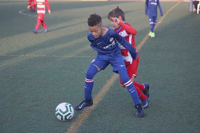 Lance del encuentro entre Chelsea y Granada (TORNEO CIUDAD DE PINOS PUENTE)