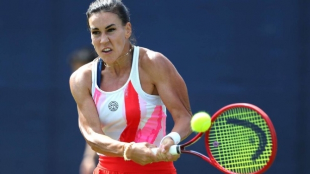 Nuria Párrizas durante el partido (WTATENNIS:COM) Nuria Párrizas durante el partido (WTATENNIS:COM)