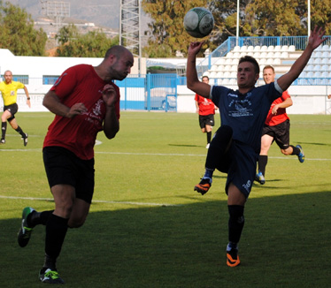 Una acción del partido Puerto - Puntalón de la liga pasada (GRJ)